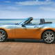 Illustration for article titled Placate Your Fears Of Global Economic Collapse With This Two-Tone Miata With A Denim Interior